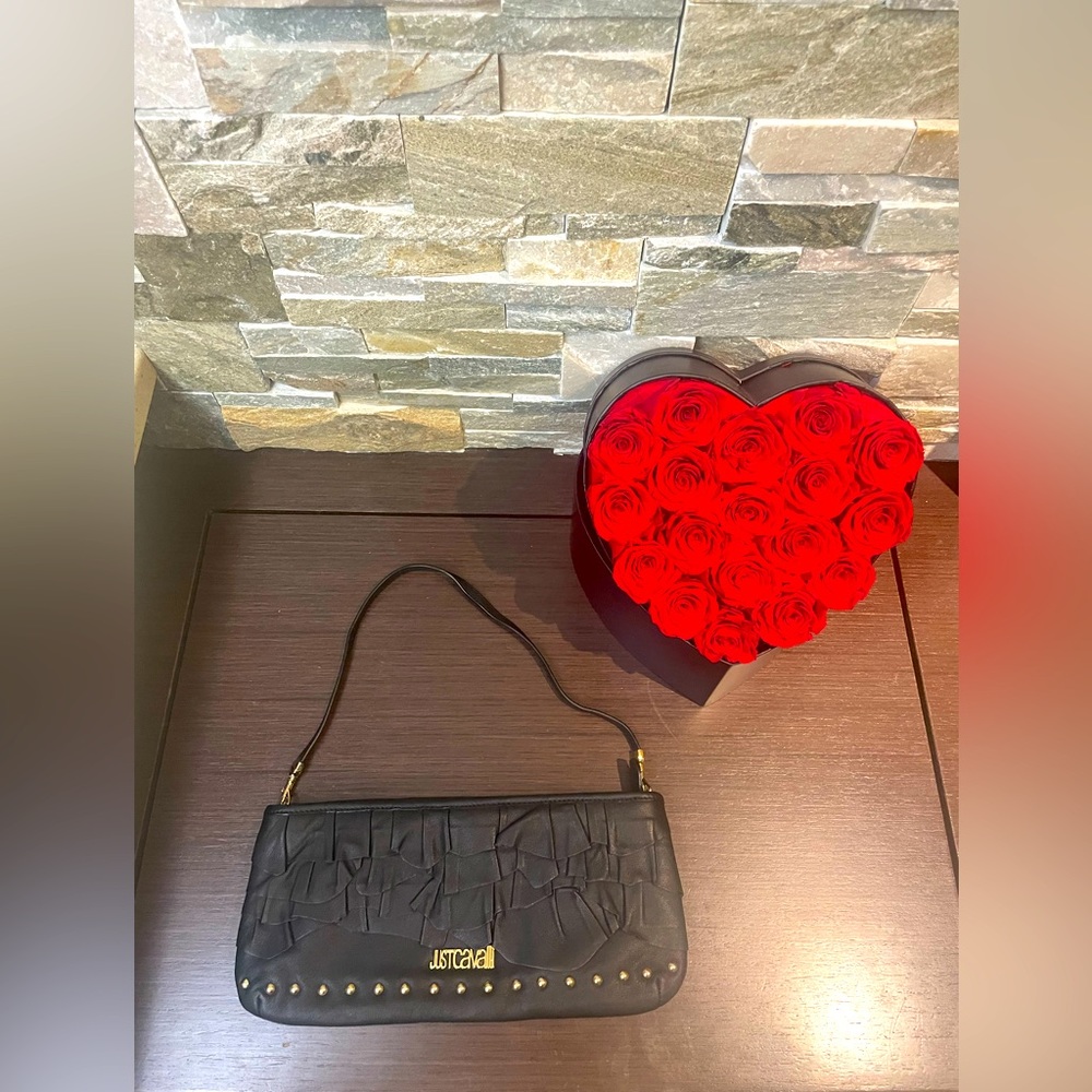 Roberto Cavalli - Just Cavalli Black leather ruffle, clutch with gold grommet